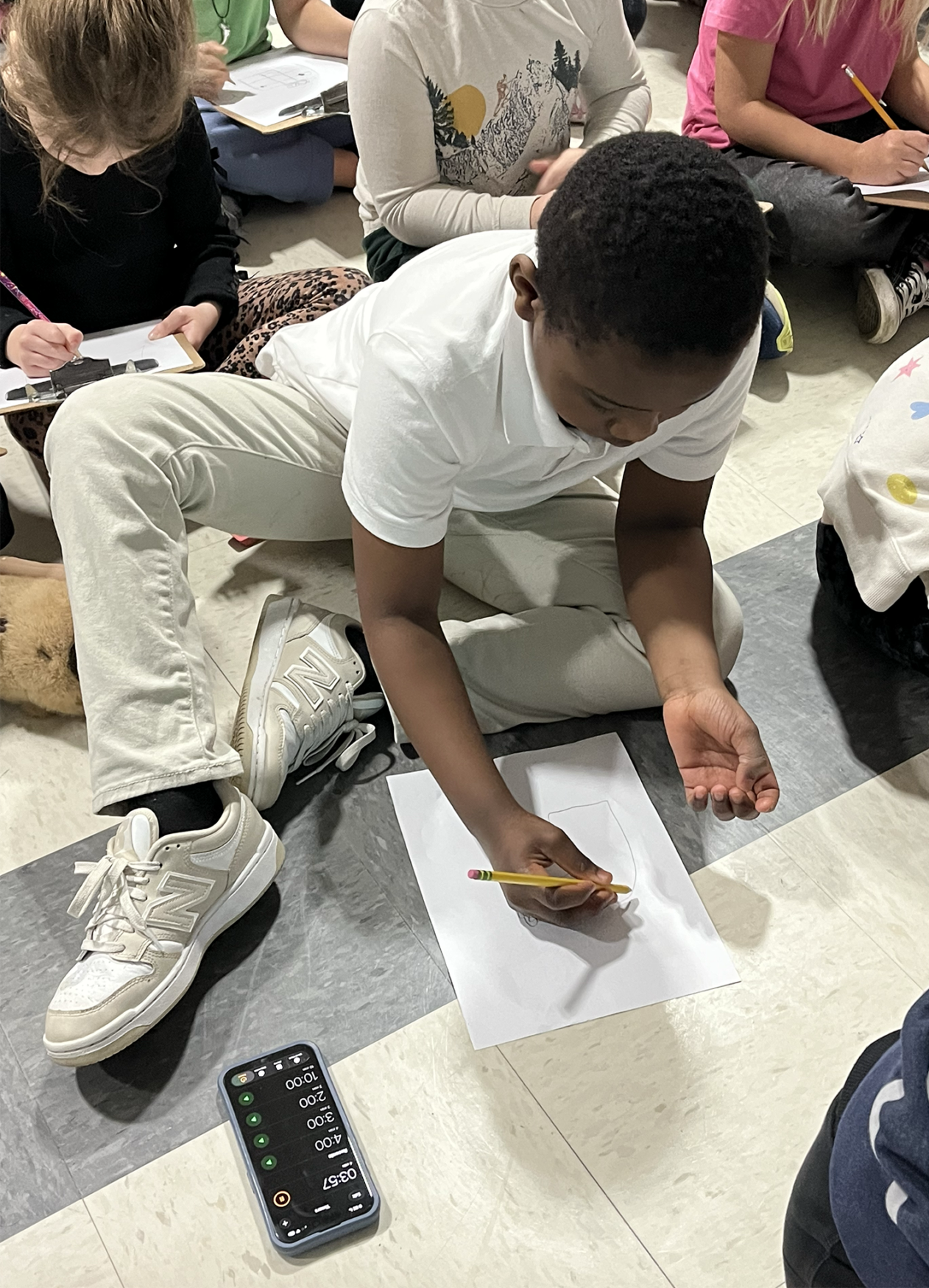 IMG_1856 Students at Harrington Elementary School create drawings during an assembly with artist Bren Bataclan on Monday, March 16, 2026.