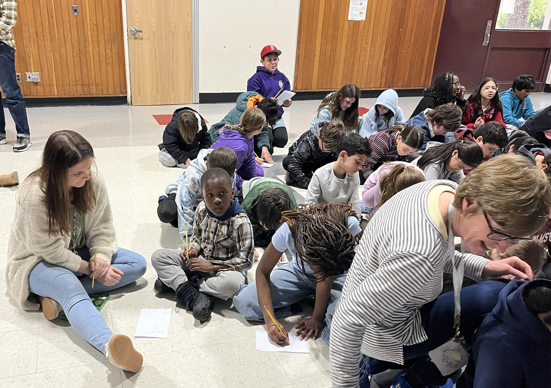 IMG_1887 Students at Harrington Elementary School create drawings during an assembly with artist Bren Bataclan on Monday, March 16, 2026.