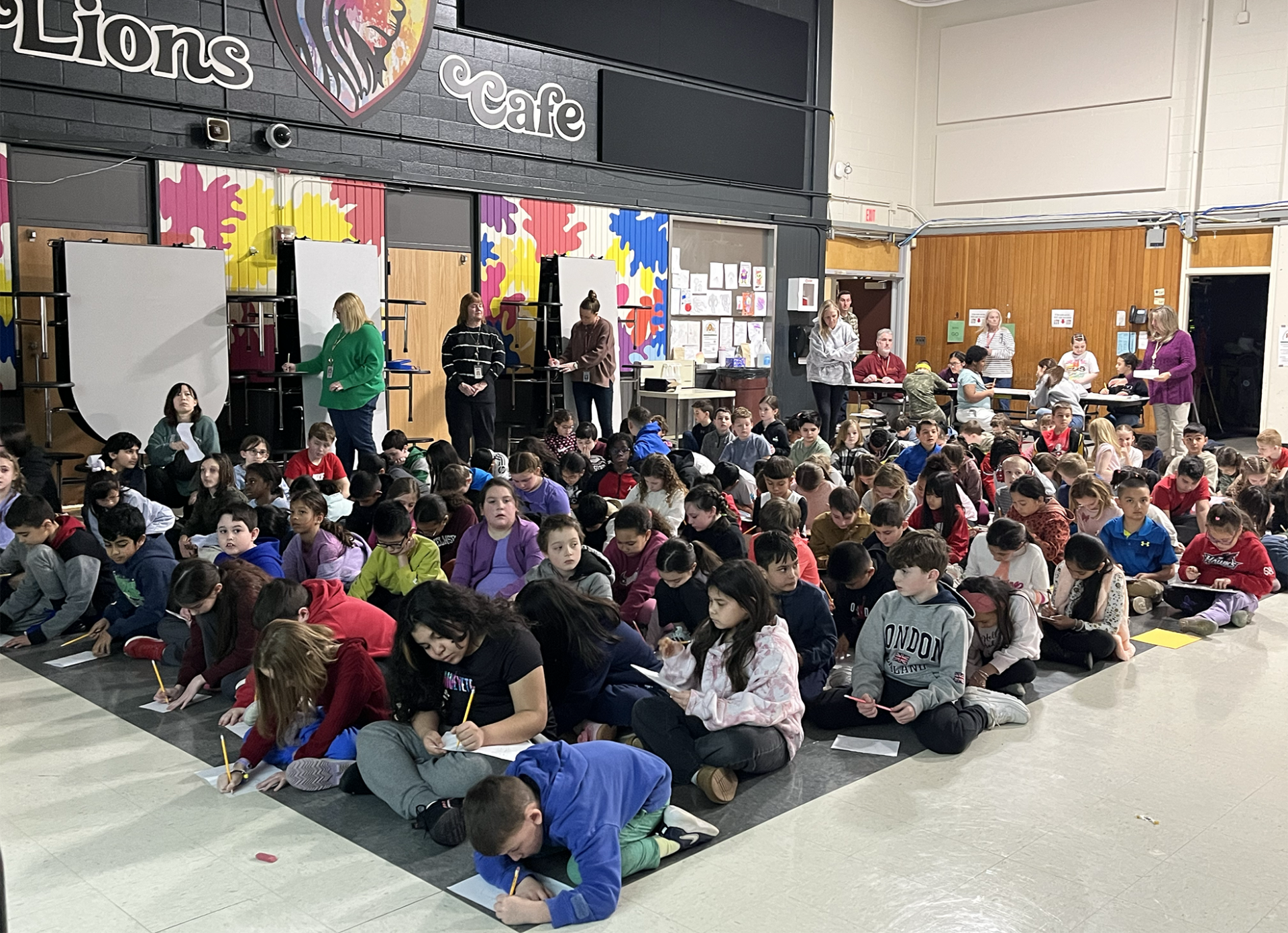 IMG_1903 Students at Harrington Elementary School create drawings during an assembly with artist Bren Bataclan on Monday, March 16, 2026.