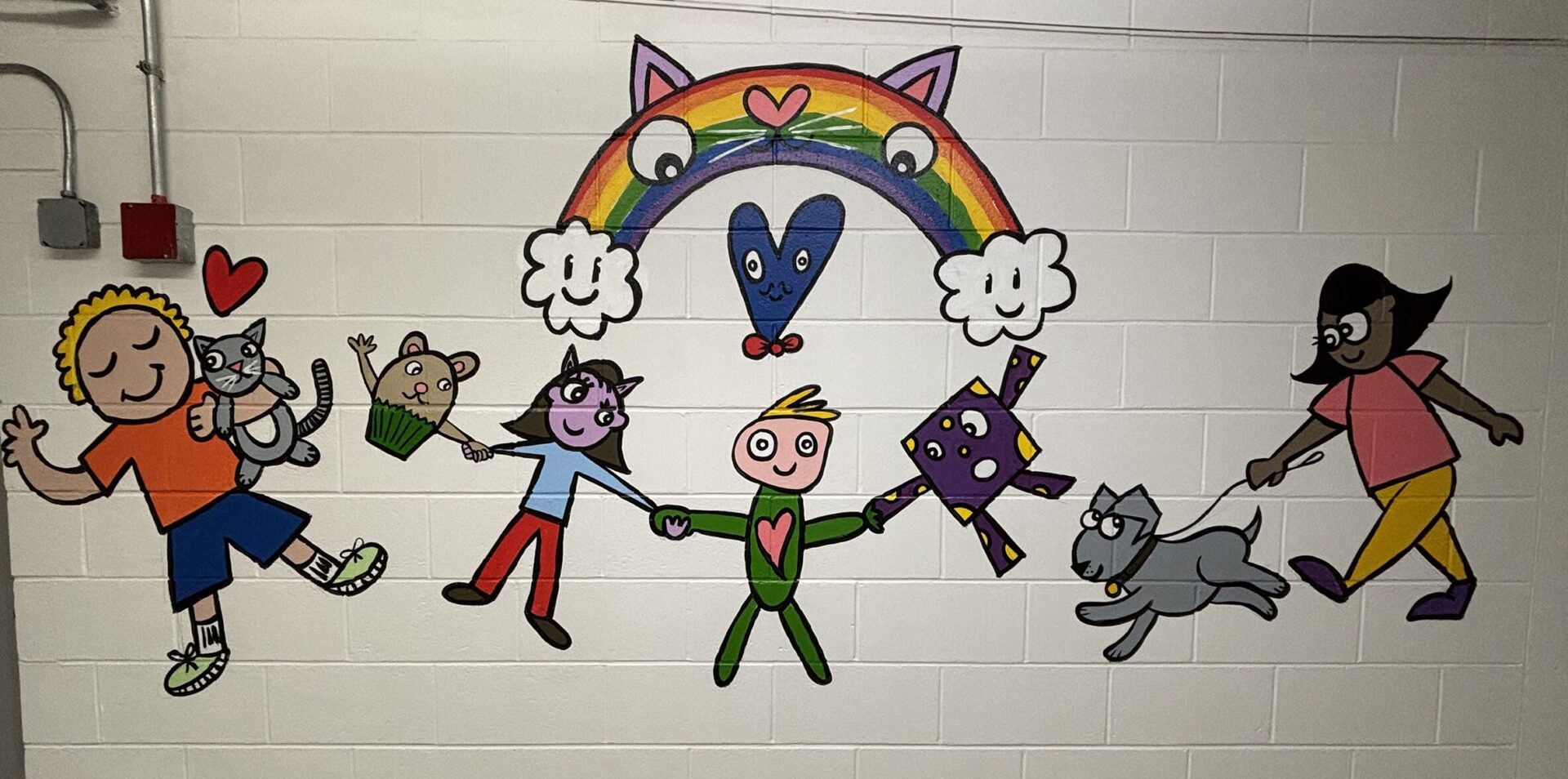 IMG_3361 A section of Bren Bataclan's completed mural in the hallway at Harrington Elementary School.