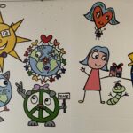 A section of Bren Bataclan's completed mural in the hallway at Harrington Elementary School.