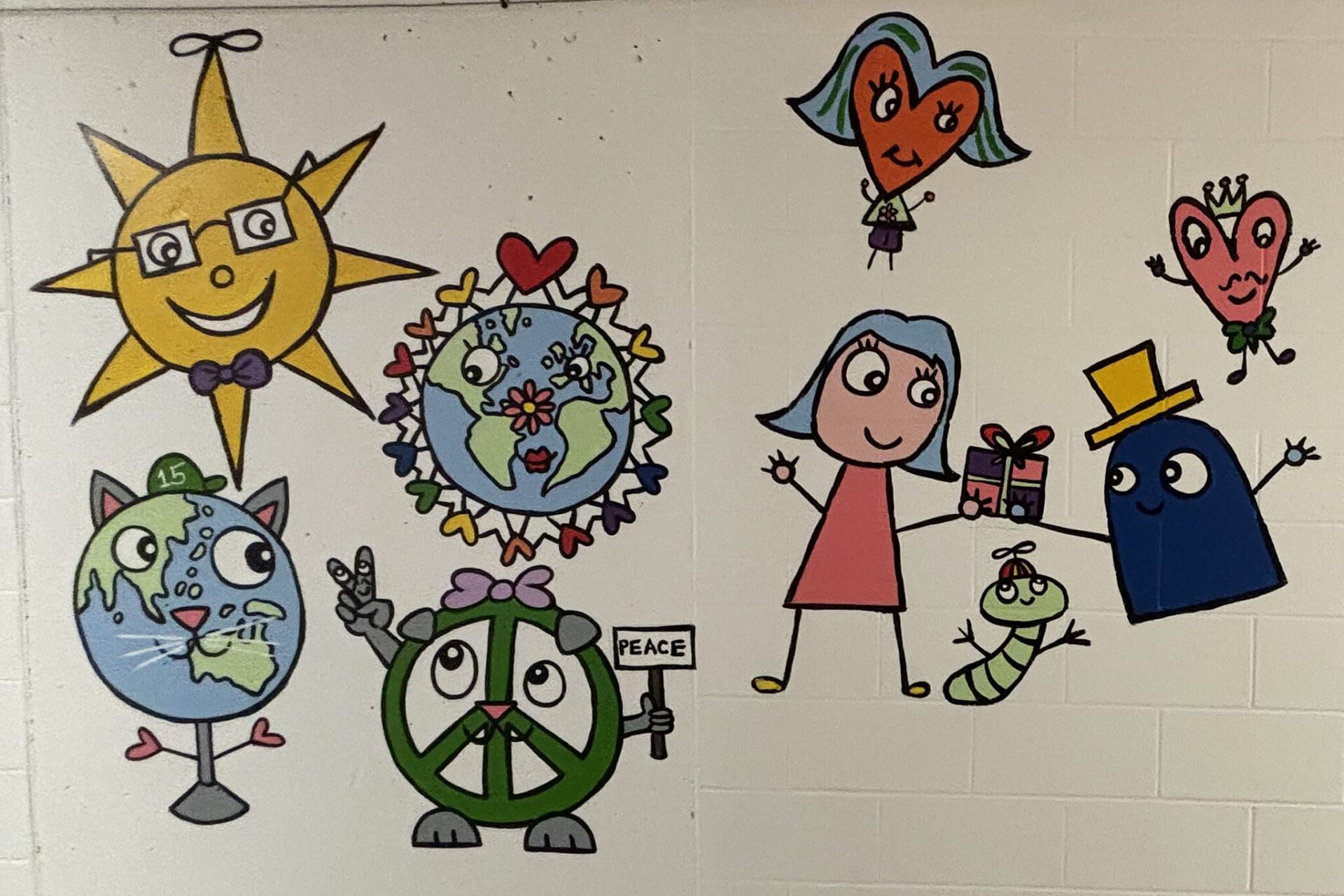 IMG_3364 A section of Bren Bataclan's completed mural in the hallway at Harrington Elementary School.