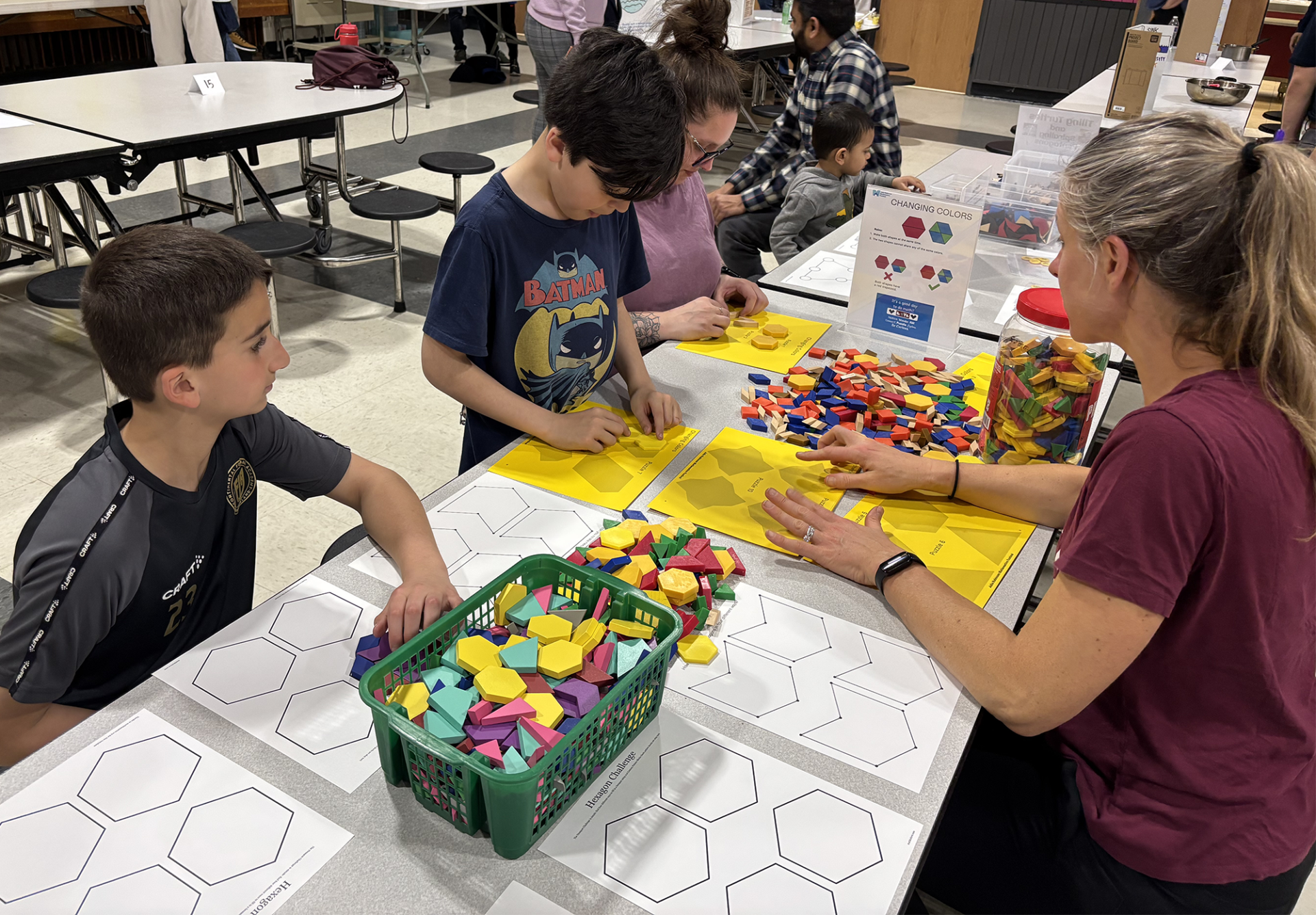 One of the activity stations at the Harrington Elementary School STEAM Fair had kids using a variety of tiles to make shapes.