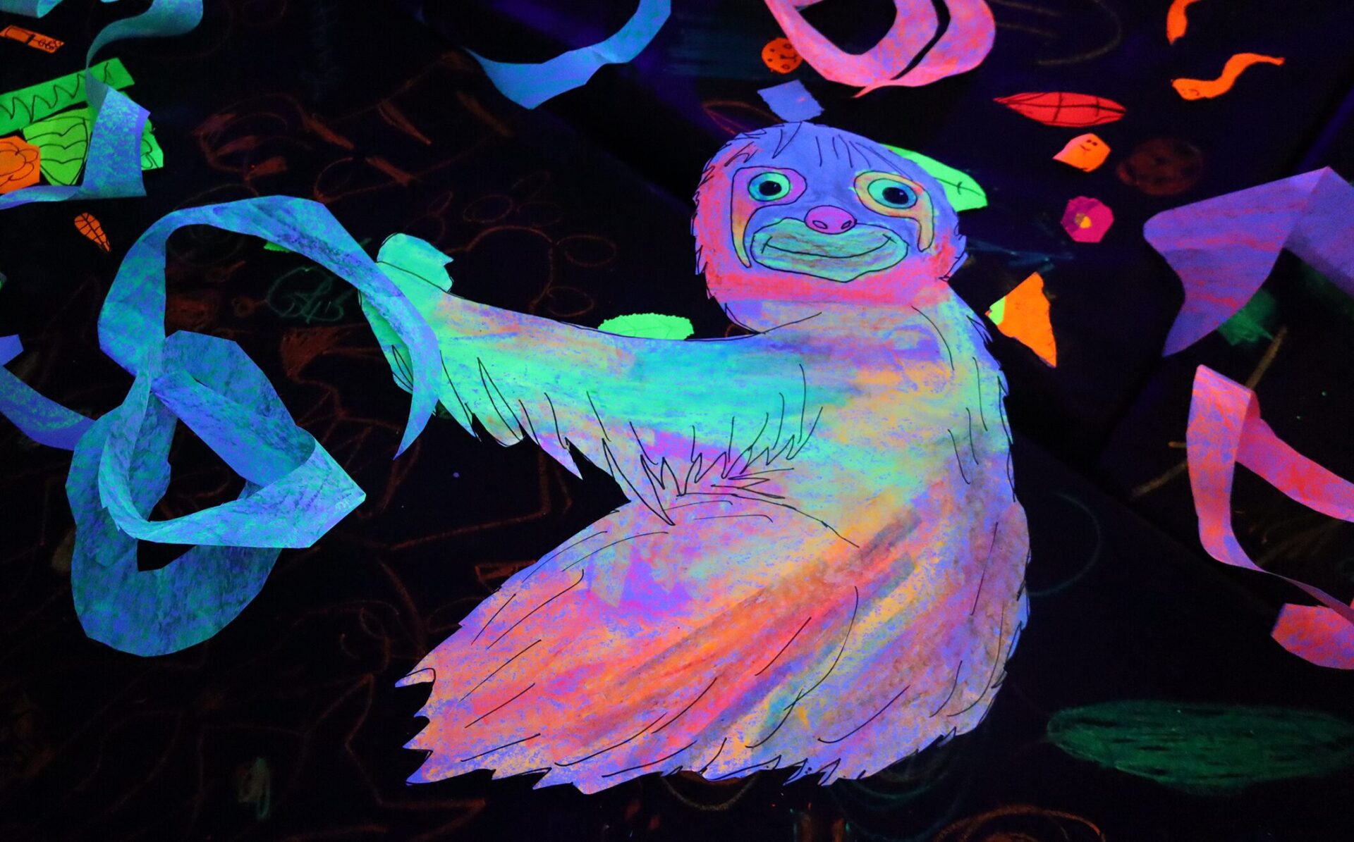 The art room at Harrington Elementary School was transformed into a glow-in-the-dark rainforest during the Celebration of the Arts event on Wednesday, May 22, 2026.